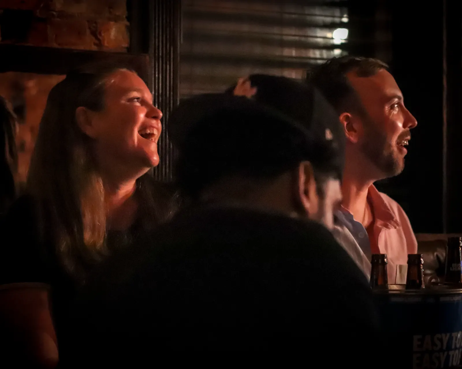 Audience laughing during a stand-up show at Upper East Side Comedy Club