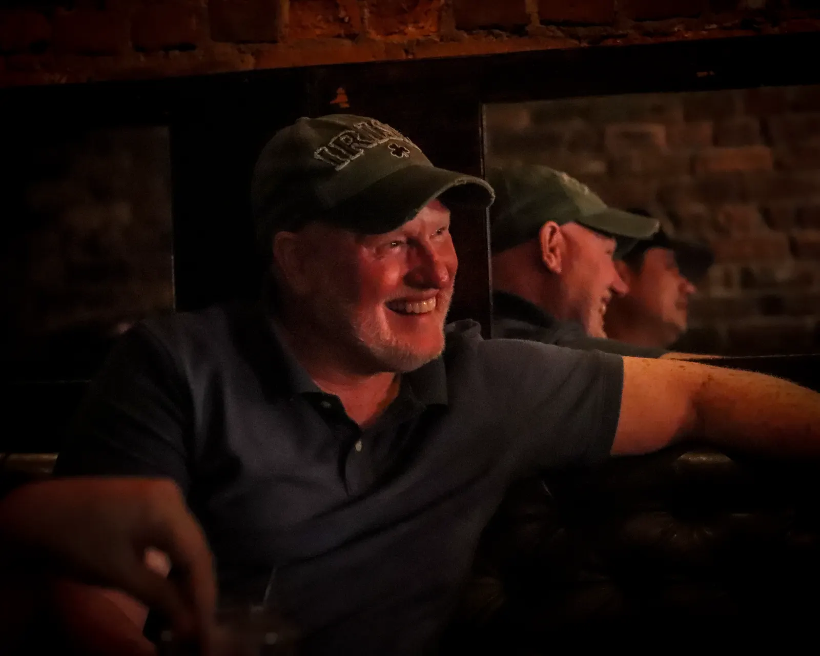 Audience member laughing during a set at Upper East Side Comedy Club