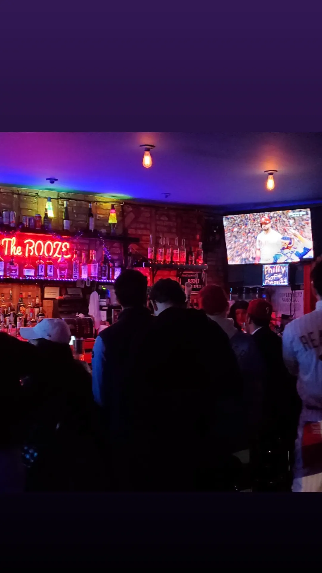 Crowd at the bar before a comedy show