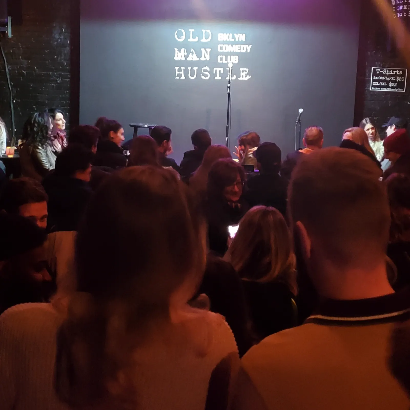 Sold-out crowd watching stand-up at Old Man Hustle BKLYN Comedy Club